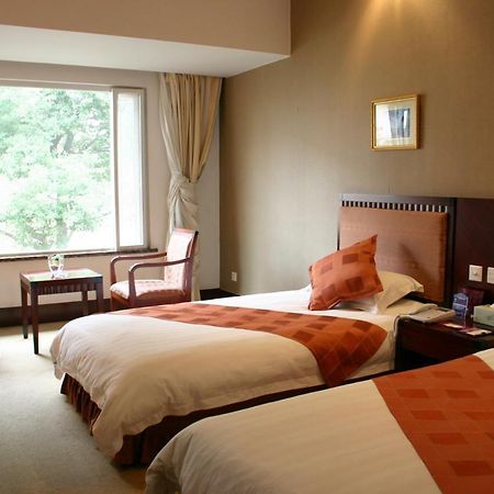 Suzhou Taoyuan International Holiday Hotel Ruang foto
