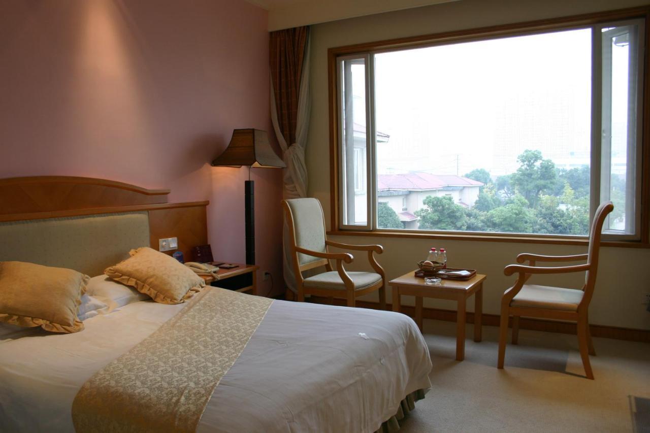 Suzhou Taoyuan International Holiday Hotel Bagian luar foto